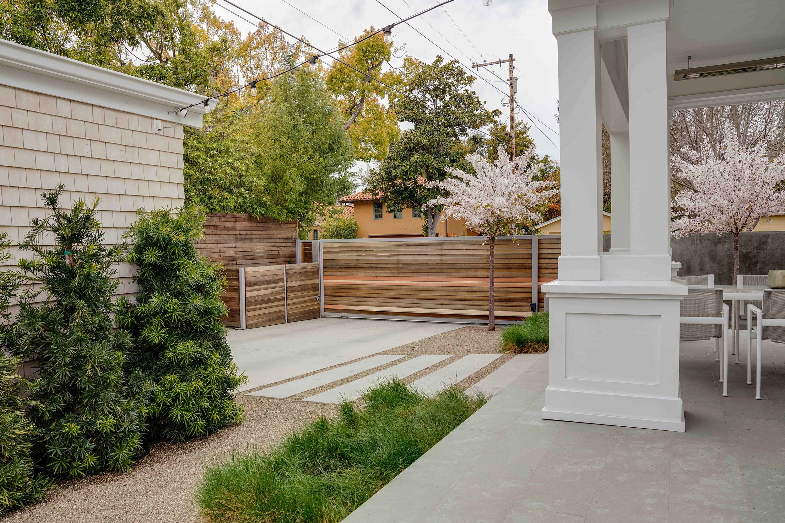 Creating Spaces Palo Alto, CA backyard area concrete and plantings along walk way